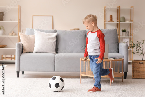 Cute little football player...