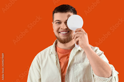 Young man with eye occluder...