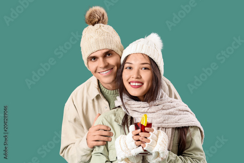 Happy couple in warm clothe...