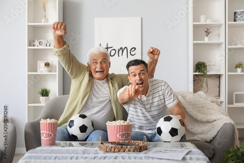 Young man with his father w...