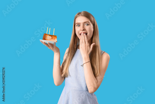 Surprised young woman with ...