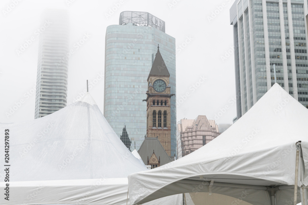 Naklejka premium event tents, Old City Hall Clock Tower, and Cadillac Fairview tower at 20 Queen St W, Toronto