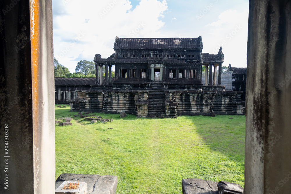 Naklejka premium Angkor Wat temple complex in Siem Reap, Cambodia, is a UNESCO World Heritage site and the largest religious monument in the world.