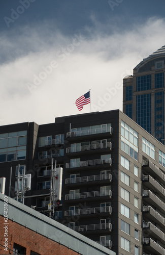American Flag Above Seattle Waterfront Neighborhood on Memorial Day Weekend
