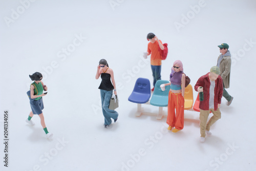 Miniature pedestrians crowded urban lifestyle scene