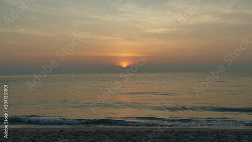 Beautiful tropical beach and sea landscape at sunrise time
