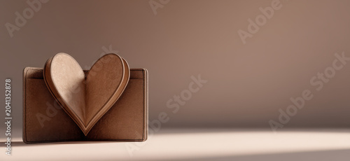 A simple brown envelope unfolds to reveal a delicate paper heart, symbolizing love and affection. This minimalist composition evokes warmth and tenderness.