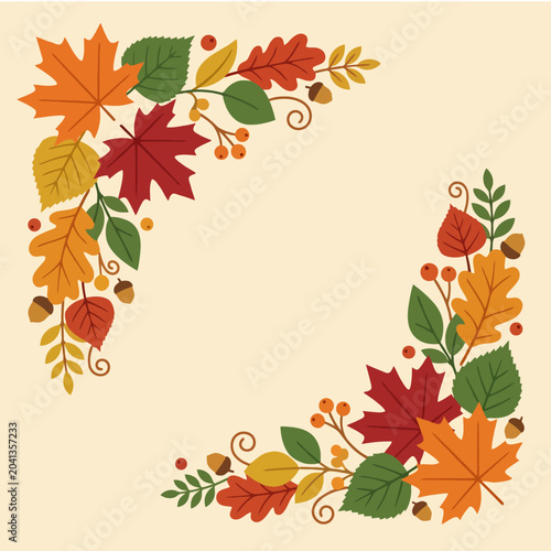 Decorative autumn leaves arranged in two corners of the frame
