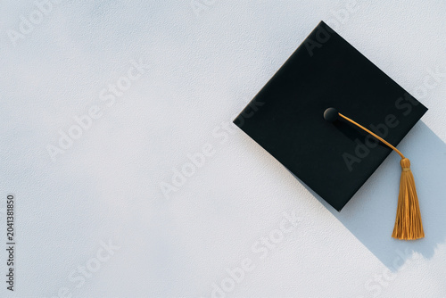 Minimal Graduation Cap Background with Elegant Copy Space
