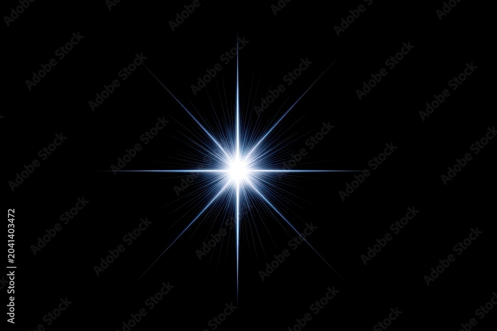 Obraz premium A brilliant star with radiant beams against a black background.