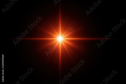 Glowing orange starburst against a black background, creating a dramatic visual effect.