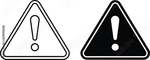 Two warning signs with an exclamation mark one in outline and the other as a solid black shape