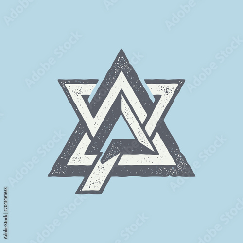 A geometric star shape with a distressed texture on blue background