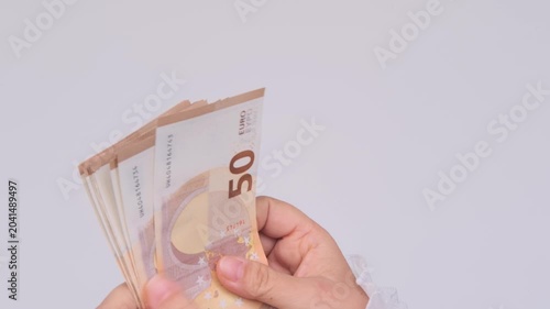 female hands hold money, count paper euro banknotes, Euro bills cash payments, savings, banking, save for vacation, exchange and cashing currency, monetary value, financial responsibility