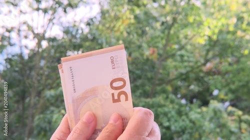 female hands hold money, count paper euro banknotes, Euro bills cash payments, savings, banking, save for vacation, exchange and cashing currency, monetary value, financial responsibility