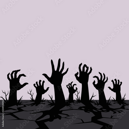 фотографія Silhouette of hands reaching up from the ground with a cracked surface