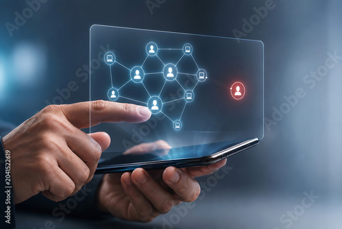 Person touches digital network of people icons on smartphone interface hand technology