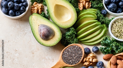 Fresh, vibrant, healthy food arranged artfully, showcasing fruits, nuts, seeds