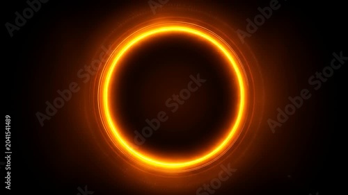 Glowing golden ring over black void. Circular, with multiple layers of light and dark