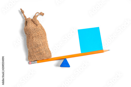 Tableau sur toile Balance Scale Concept Using Pencil Seesaw with Weight and Counterweight