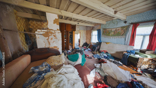 Принти на полотні Abandoned room showing extreme hoarding and mess inside a neglected old house