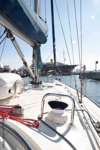 close up of yacht deck with rigging elements and equipment.