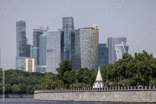 Photography Moscow-City modern skyline with river and autumn foliage