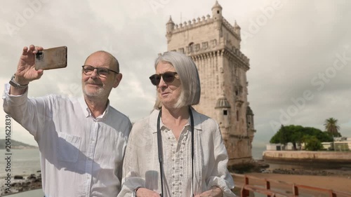 Senior Couple Taking Selfie in Front of Historic Bel�m Tower, Lisbon