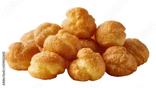 Bild auf Leinwand Pile of golden brown cream puffs pastry