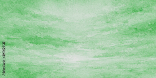 Fotografía Green grass field under sky with clouds nature landscape background