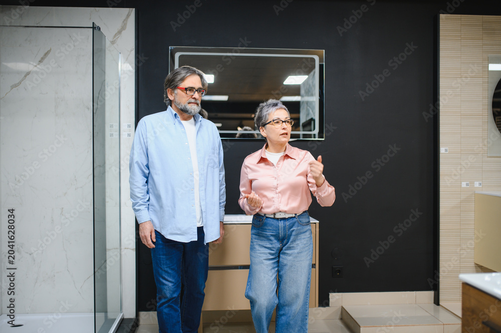 Fototapeta premium Senior couple considering new bathroom design