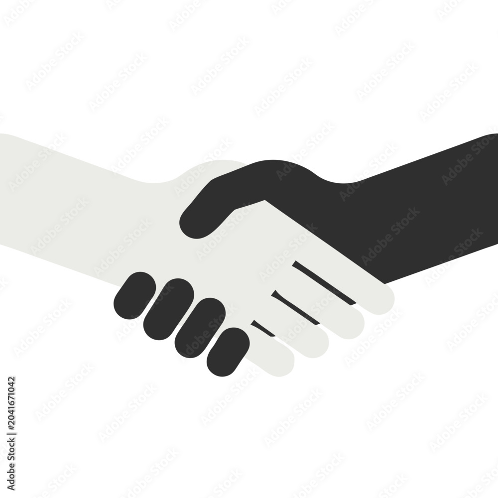 Fototapeta premium Two hands, one black and one white, shaking in agreement