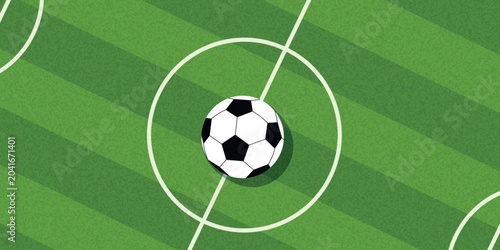 Aerial view of a soccer ball with a soft shadow on a green grass football pitch background with white line markings. Sports stadium field template for match schedules and game day promotions