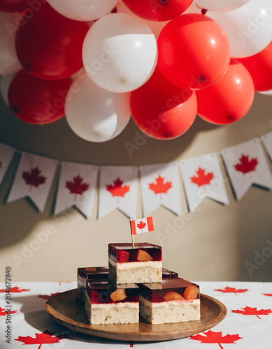Canada day celebration a festive image with maple leaves and patriotic text
