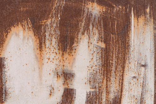 Texture of rusty metal with traces of a brush