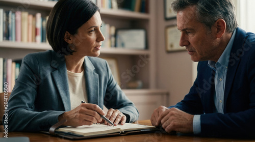 Serious Discussion Between Professional People During Important Business Meeting Session