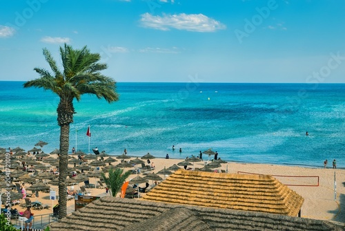 Fotografie Hammamet, Tunisia - MAY 16, 2025: Beach of Hammamet, the first tourist destination in Tunisia
