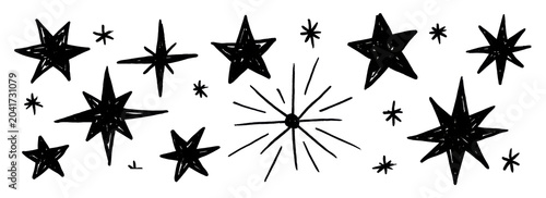 Hand-drawn black stars and sparkles on a white background