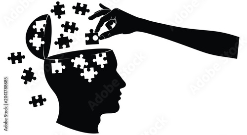 Foto A hand reaching into an open head puzzle pieces scattering out