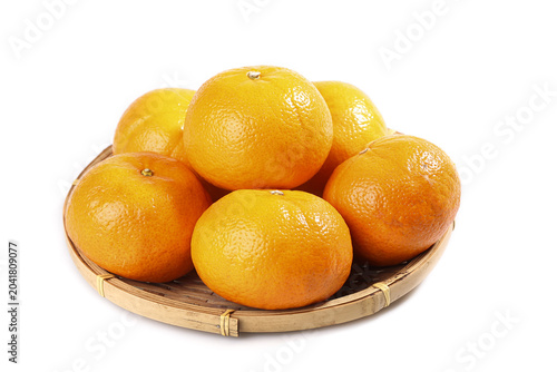 Foto Fresh Guangxi Bergamot Citrus Fruits in Bamboo Basket - Thin Skinned Orange Vari