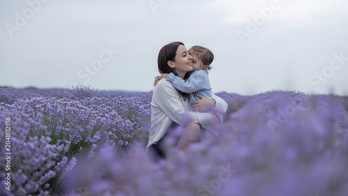 Mother and child in lavender field