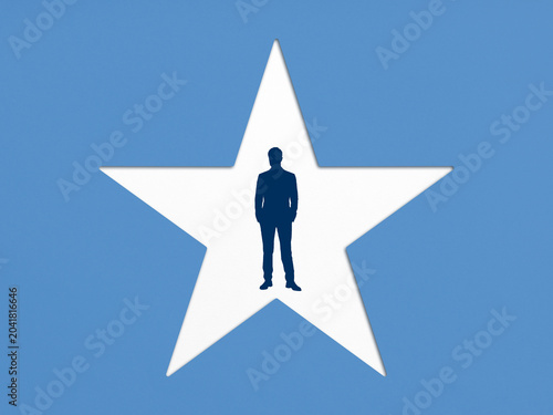 Leadership, success, and individual achievement with a businessman silhouette standing inside a white star