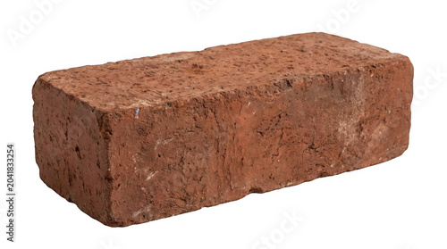 A single rectangular red clay brick with a rough, porous texture isolated against a solid black background, angled view