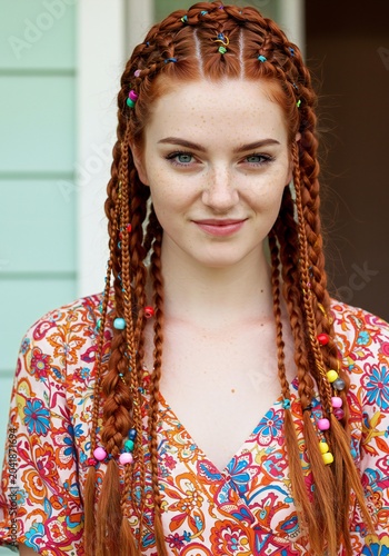 Young Woman with Red Braids and Colorful Beads, Smiling Portrait