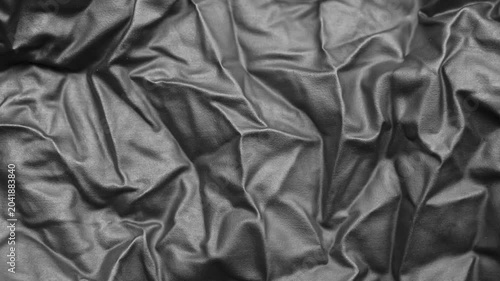 Abstract Black Rubber Latex Texture Background with Elegant Folds and Shadows