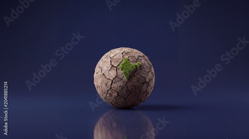 Cracked Earth with Emerging Green Life – Environmental Recovery Concept