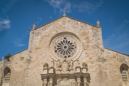 The famous rose window from the facade of the Cathedral of Santa Maria Annunziata or Otranto Cathedral; Province of Lecce, Salento, Puglia, Italy
