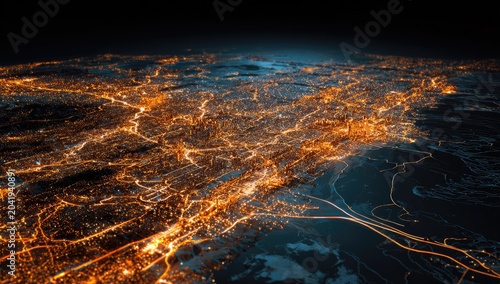 Illuminated city network from above at night, glowing infrastructure