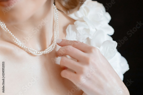 Elegant Pearl Necklace on Bride During Wedding Day Preparation