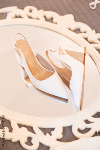 Elegant White Bridal Slingback Heels Prepared for Wedding Day Celebration